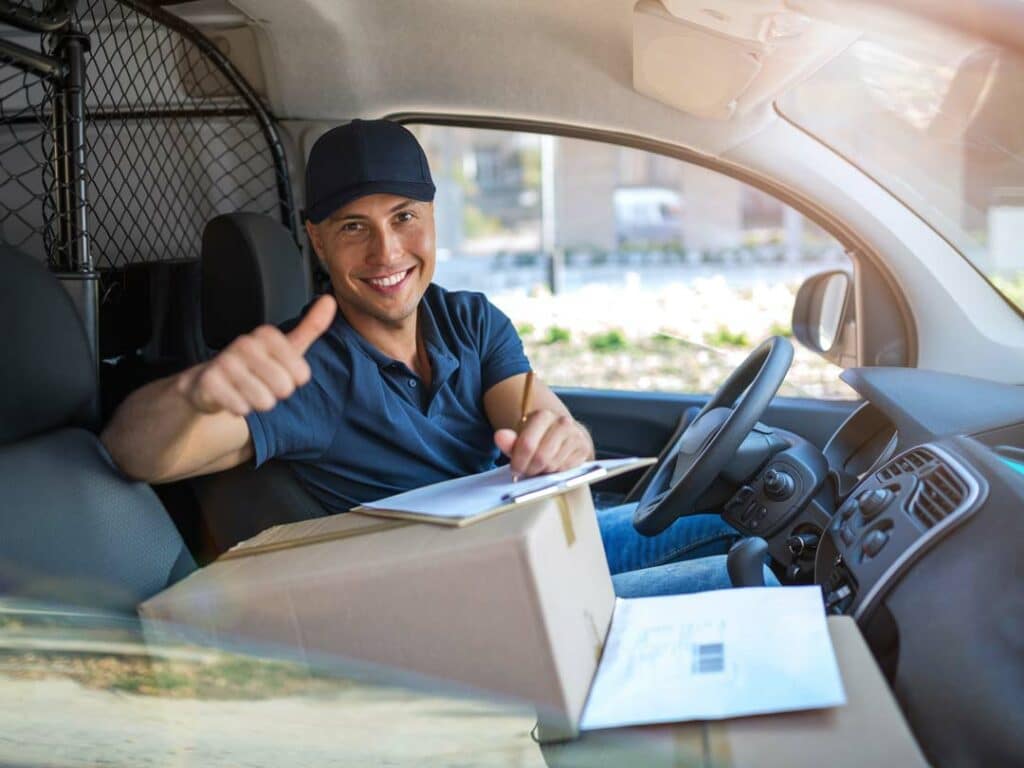 Delivery driver on his way to deliver customer parcels