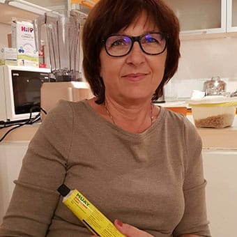 Elderly woman with Muay cream