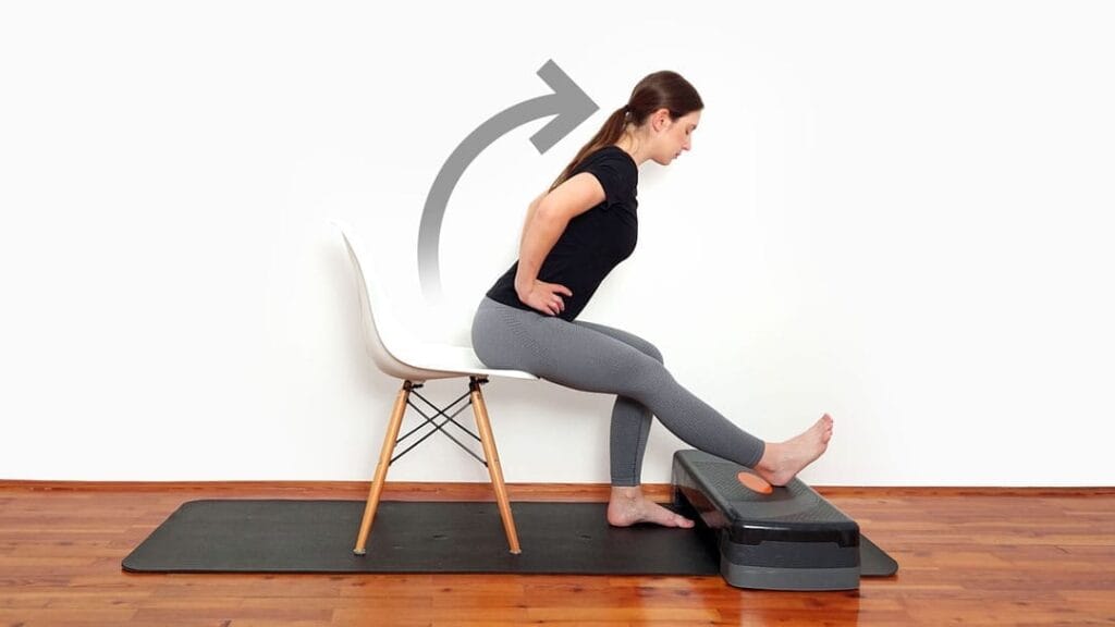 Raztezanje mišic zadnje lože v sedečem položaju korak 2