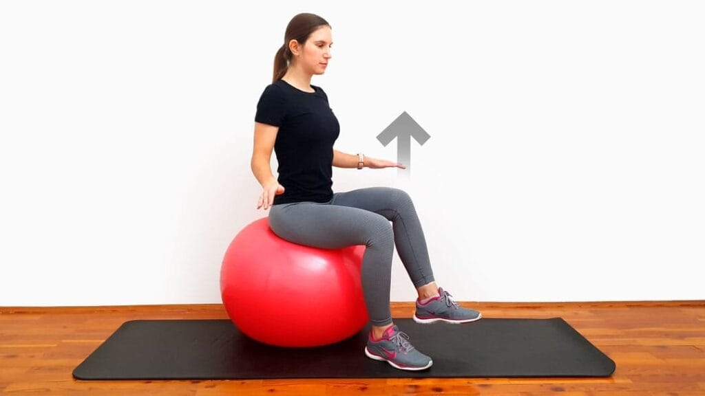 Upogib kolka na švicarski žogi korak 3